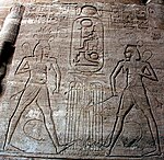 Hapi tying the papyrus and reed plants in the sema tawy symbol for the unification of Upper and Lower Egypt